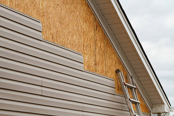 Professional Storm Damage Siding Repair technician working in Troy, SC